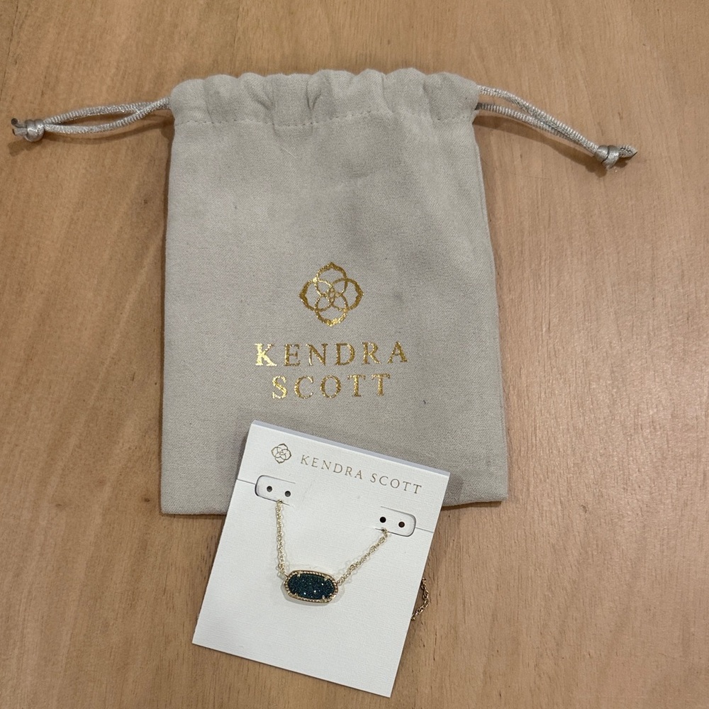 Kendra Scott Gold Necklace with Deep Blue Stone